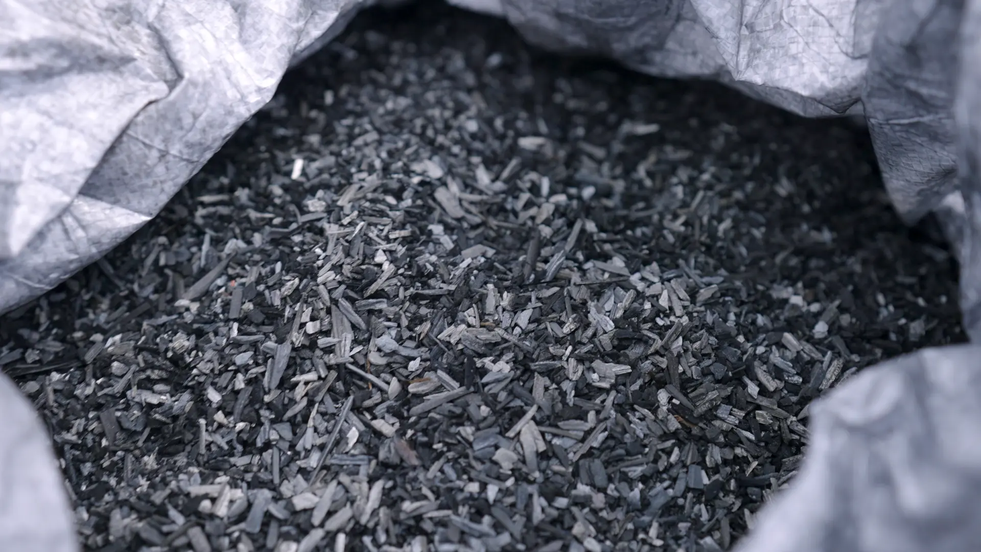 Close-up of finished biochar in a bulk bag